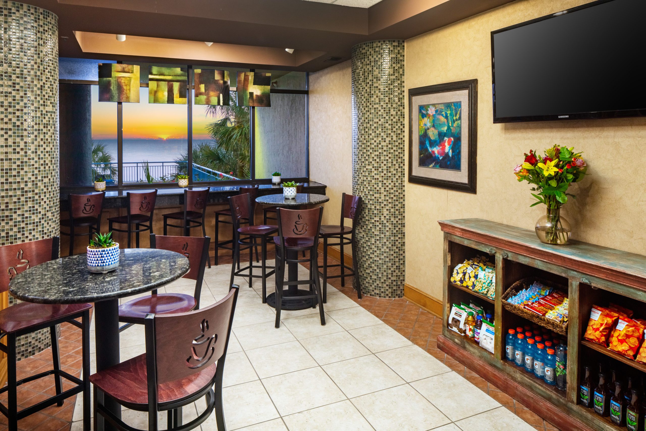 Coral Bean Cafe seating area at Coral Beach Resort in Myrtle Beach