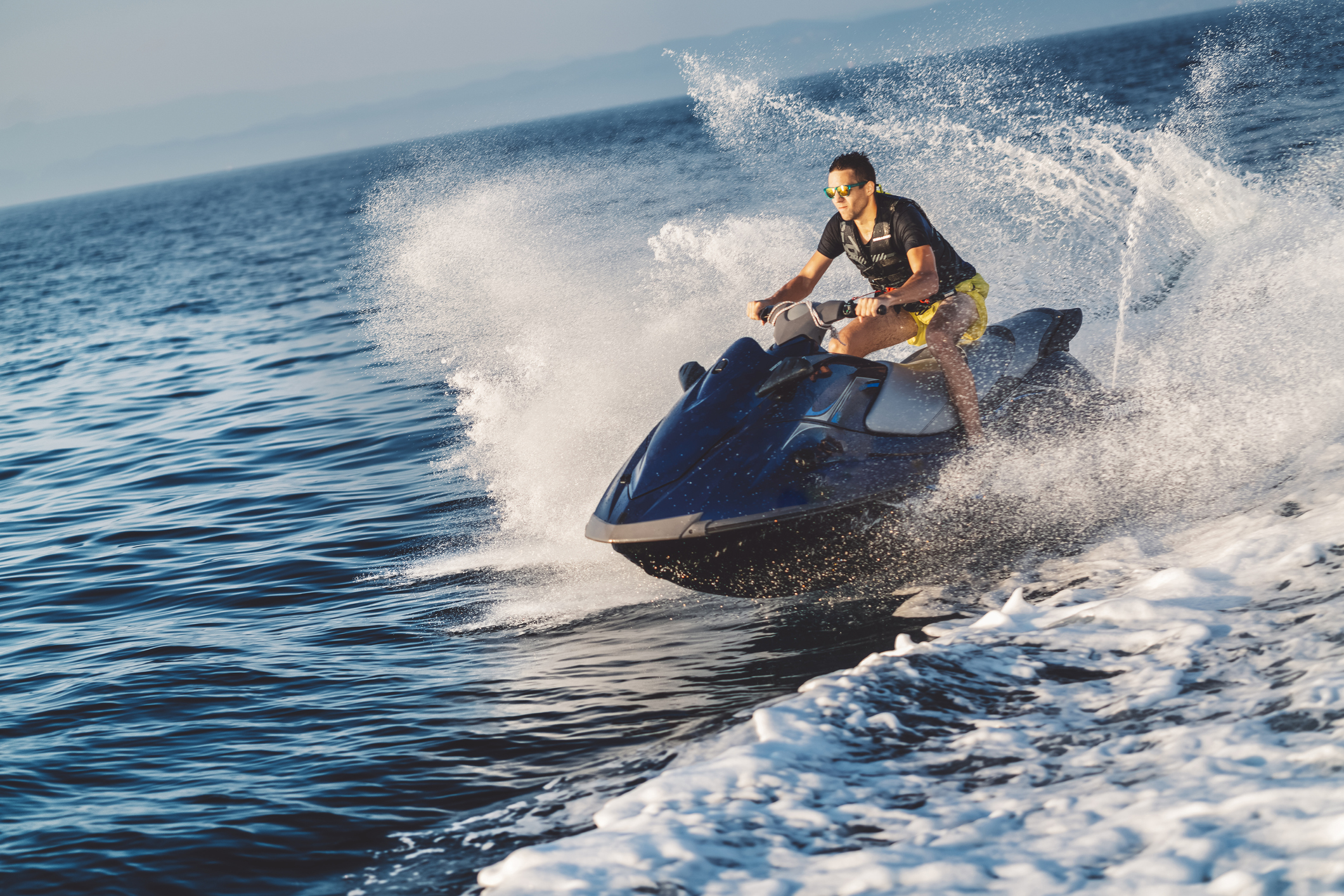 Man jet skiing in the ocean