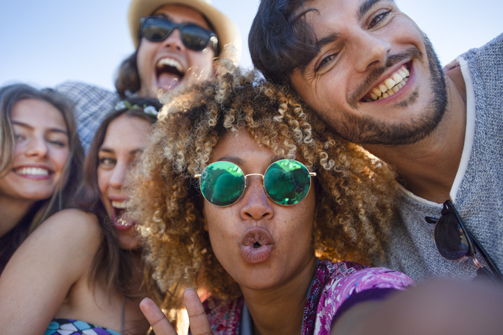 Group of friends having fun taking a selfie - one of the top Things to do in Myrtle Beach in Spring
