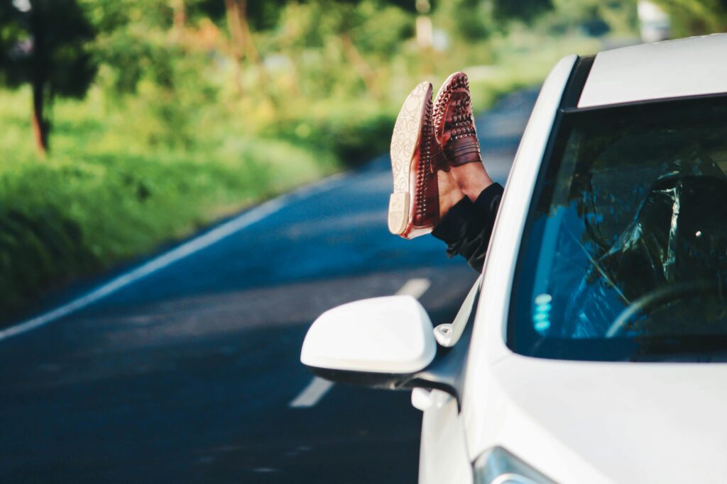 Feet out the window on a road trip to Myrtle Beach