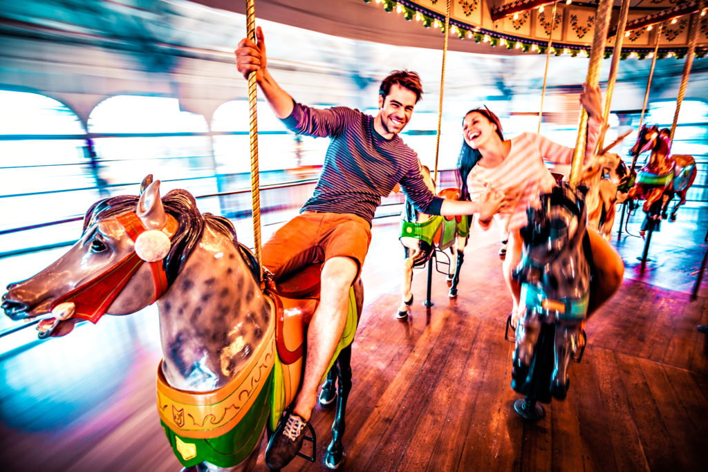 Couple enjoying a ride on their Myrtle Beach Honeymoon