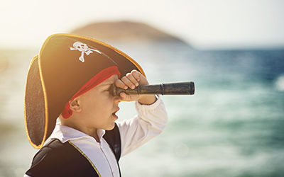 young pirate with spyglass
